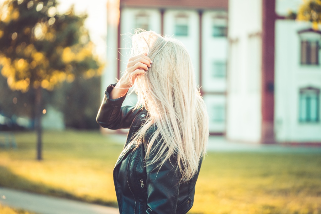 blonde-woman-playing-with-hair-against-sun-picjumbo-com.jpg