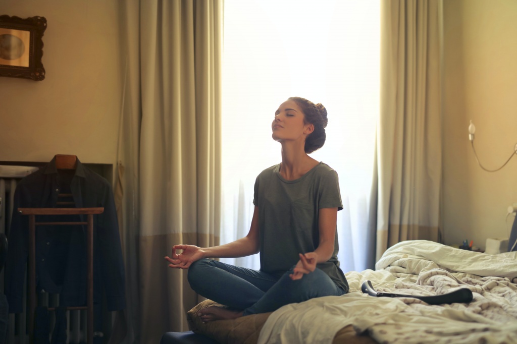 woman-meditating-in-bedroom-3772612.jpg