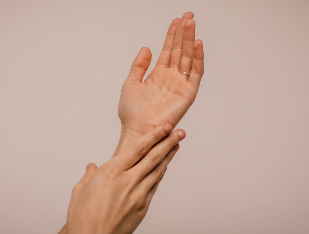 person_touching_hand_1242349-2.jpg