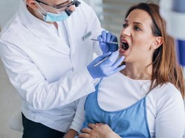 Протезирование зубов во время беременности: можно или нет 